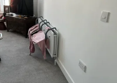 Clothes drying on a radiator drying bar