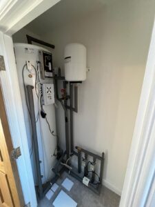Image showing a heating system installed in a cupboard space