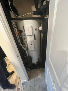 Image showing a heating system installed in a cupboard space