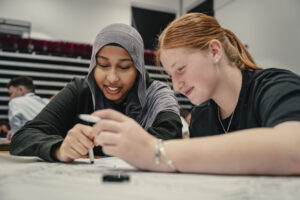 Two pupils work on an activity